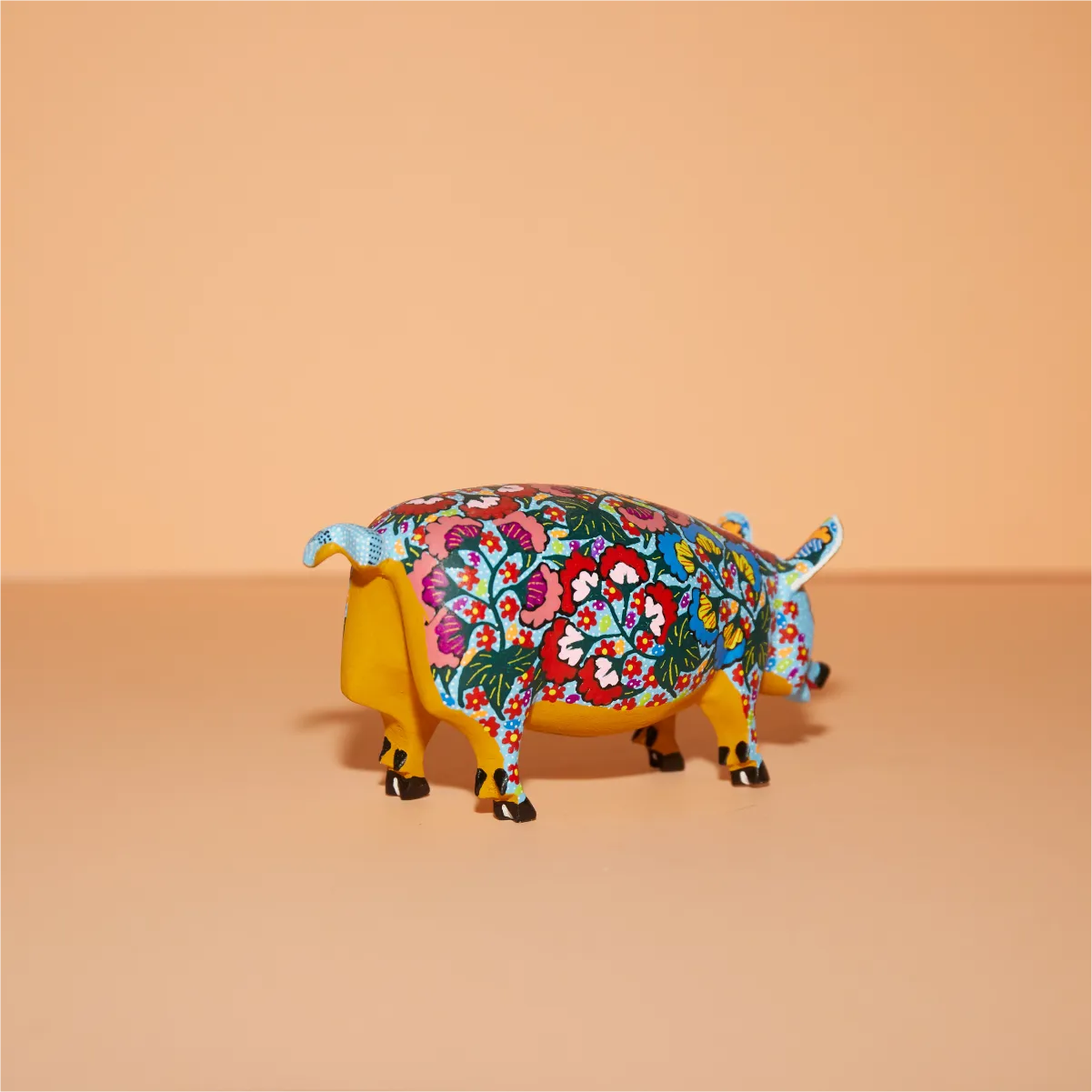 Cerdito cara azul claro trasera