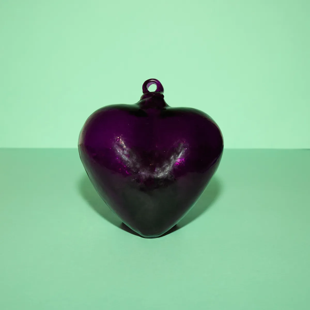 Corazón vidrio morado