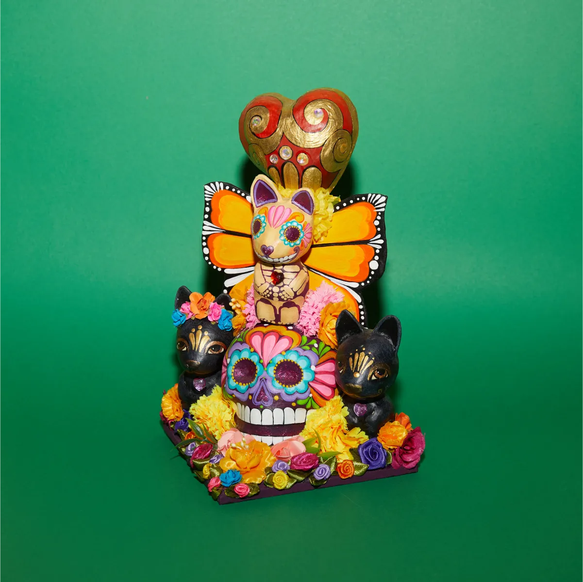 Cráneo con mascotas delantera